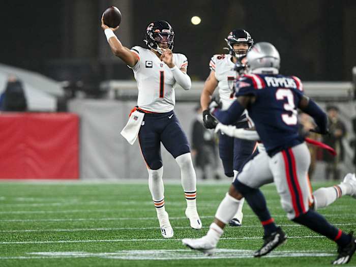 Oct 24, 2022; Foxborough, Massachusetts, USA; Chicago Bears quarterback Justin Fields (1) passes the ball against the New England Patriots during the first half at Gillette Stadium.